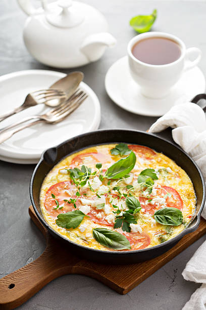 Frittata with herbs, tomatoes and feta cheese